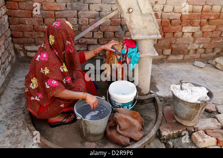 Woman doing laundry, Mathura, Uttar Pradesh, India, Asia Stock Photo