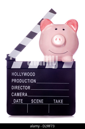 Piggy bank with film clapper board studio cutout Stock Photo