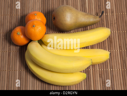 Assorted fruit on wood background Stock Photo