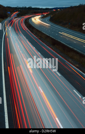 A slow speed shot of traffic traveling along the M20 motorway in Kent, England. Stock Photo