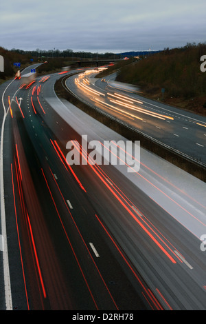 A slow speed shot of traffic traveling along the M20 motorway in Kent, England. Stock Photo