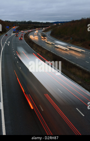 A slow speed shot of traffic traveling along the M20 motorway in Kent, England. Stock Photo