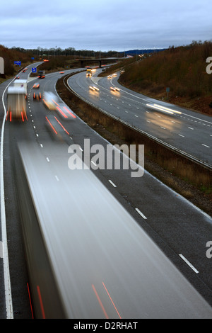 A slow speed shot of traffic traveling along the M20 motorway in Kent, England. Stock Photo