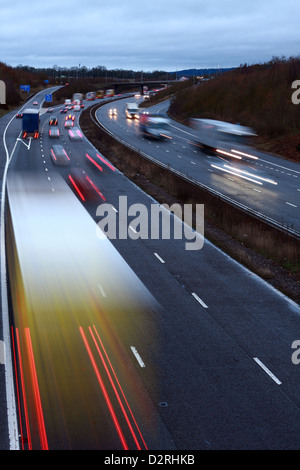 A slow speed shot of traffic traveling along the M20 motorway in Kent, England. Stock Photo