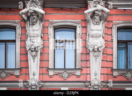 Facade with men statues of an old palace in St.Petersburg, Russia. Belosselsky-Belozersky Palace is Neo-Baroque style Stock Photo