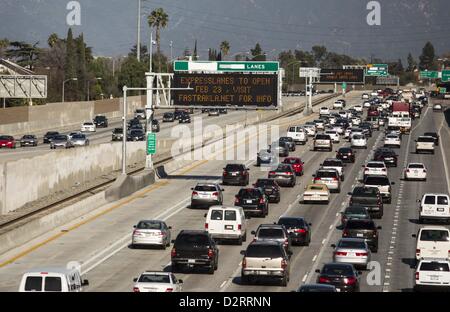 Jan. 31, 2013 - Los Angeles, California (CA, United States - A sign with the new express lanes information is shown along eastbound of I-10 freeway near Monterey Park, California, Thursday, January 31, 2013.  The Los Angeles Metro has announced the express lanes program will begin Feb. 23 along an 14-mile stretch of the 10 Freeway between El Monte and Los Angeles. The solo riders will be allowed to ride the carpool lanes 24 hours a day on the 10 Freeway between the 605 Freeway and Alameda Street for a toll. The addition of solo riders is part of a $290 million Metro experimental program that w Stock Photo