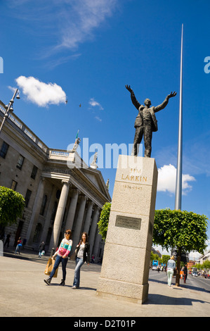 Vertical streetscape of O'Connell street, with the General Post Office, the Jim Larkin statue and the Spire of Dublin on a sunny Stock Photo