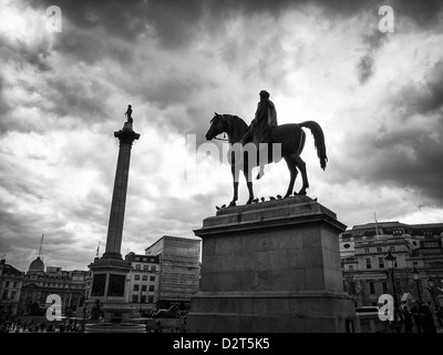 trafalgar square in rainy day with cloudy sky Stock Photo