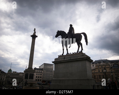 trafalgar square in rainy day with cloudy sky Stock Photo