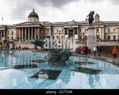 trafalgar square in rainy day with cloudy sky Stock Photo