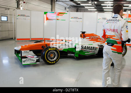 Silverstone, UK. 1st February 2013.  Paul di Resta (GBR) talks to the media, with Force India's 2013 F1 car, the VJM06, in the background.  Credit:  Elaine Scott / Alamy Live News Stock Photo