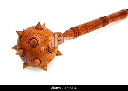 Wooden spiky souvenir mace isolated on white Stock Photo