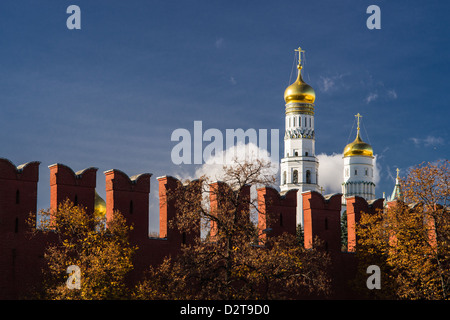 Moscow Kremlin wall and Ivan the Great bell tower in autumn against the deep blue sky Stock Photo