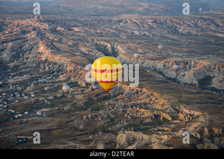First light on Goreme Historical National Park and Uchisar from hot air balloon Cappadocia Turkey Stock Photo
