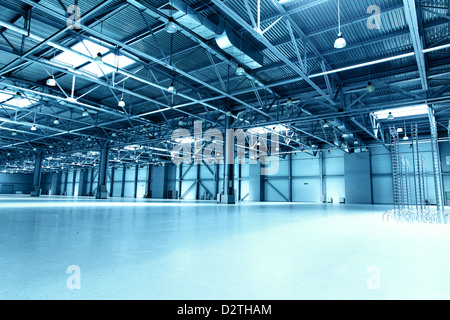 Empty storehouse toned in the blue color Stock Photo