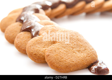 Chocolate biscuits on white table Stock Photo