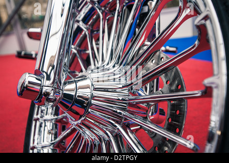 Chrome spokes on a wheel motorcycle Stock Photo