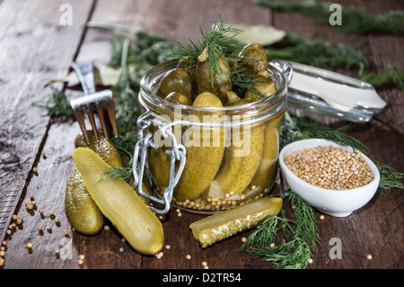 Gherkins with fresh dill in a glass Stock Photo