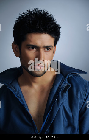 Close-up of a stylish young man posing Stock Photo