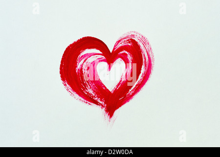 Painted red love heart on white background Stock Photo