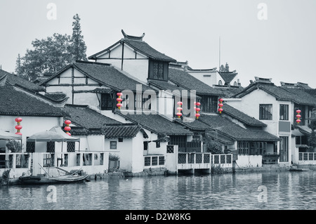 Old village by river in Shanghai in black and white Stock Photo