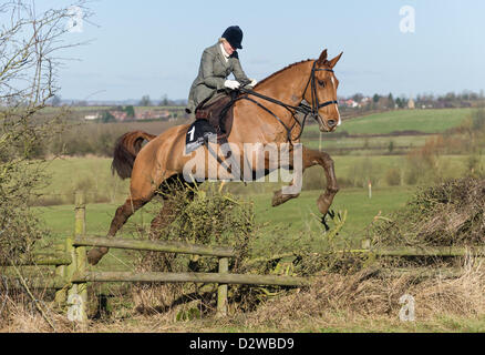 Ingarsby, Leicestershire, UK. Saturday 2nd Feb 2013. Philippa Holland jumping fences during the inaugural running of the Bernard Weatherill Sidesaddle Chase, the first race for sidesaddle riders since 1921. Stock Photo