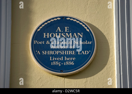 blue plaque marking a home of author a.e. housman, author of a shropshire lad, westminster, london, england Stock Photo