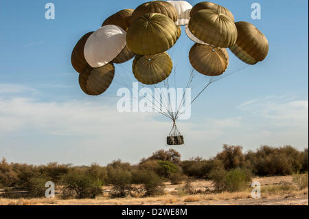 (HANDOUT) A handout provided by the French Army from the French Army Communications Audiovisual Office (ECPAD) shows paratroupers jumping out of an aircraft and landing in Timbuktu, Mali, 29 January 2013. The paratroupers will prepars a landing stip there. The French Army has penetrated areas further north in the country during the conflict with Islamic rebels in Mali. Photo: PHOTO: OLIVIER DEBES/ECPAD/HANDOUT (HANDOUT EDITORIAL USE ONLY) Stock Photo