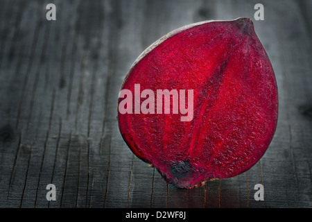 Closeup of red beet on dark wooden background Stock Photo