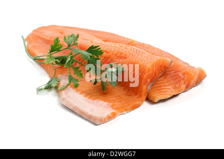 two trout fillets with parsley isolated on white background Stock Photo