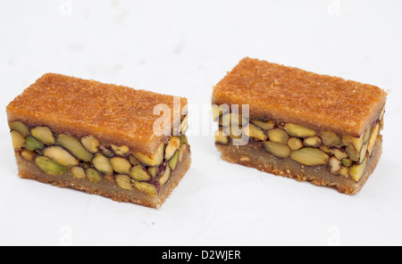 Pieces of oriental petit four isolated on white background Stock Photo