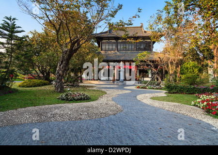Traditional Chinese house and the garden with walkway Stock Photo