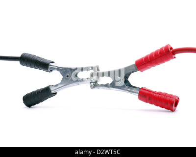 Car positive and negative, red and black, jump leads on car battery ...