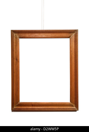 Empty picture frame hanging on white wall Stock Photo