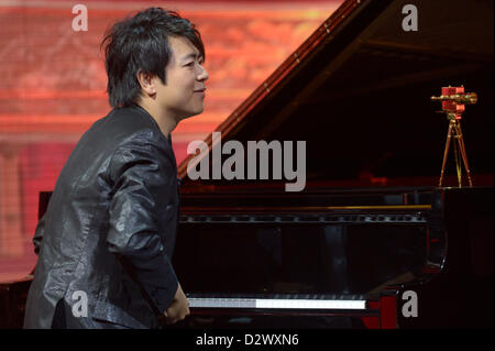 Chinese pianist Lang Lang performs music during the shooting of