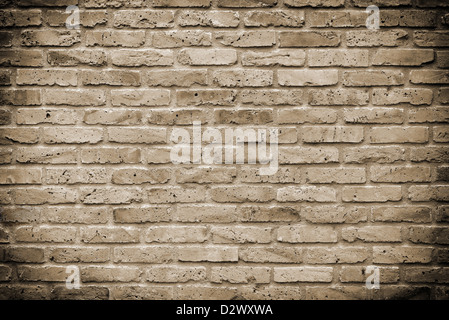Wall made of old bricks in sepia Stock Photo