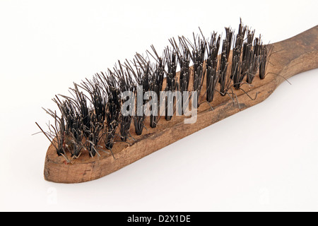 Wire brush on a plain white background Stock Photo