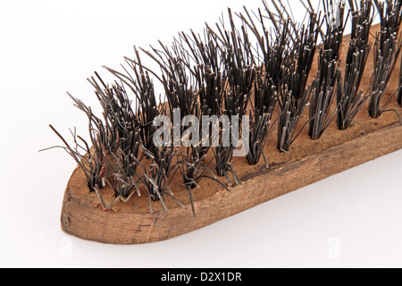 Wire brush on a plain white background Stock Photo