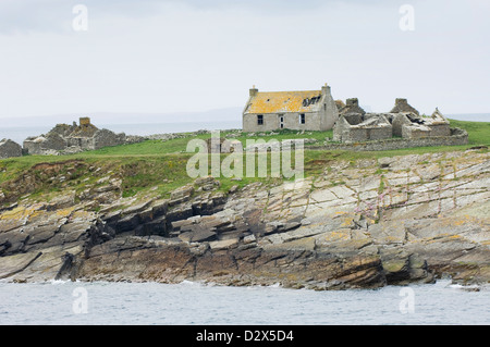 Abandoned house on the island of Swona in the Pentland Firth, between the Orkney Islands and the Scottish Mainland.
