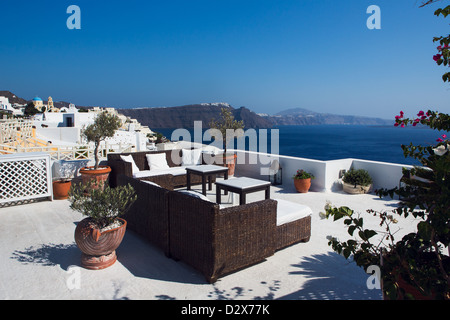 Room setting on the roof of a house in Oia Santorini, Greece. Stock Photo