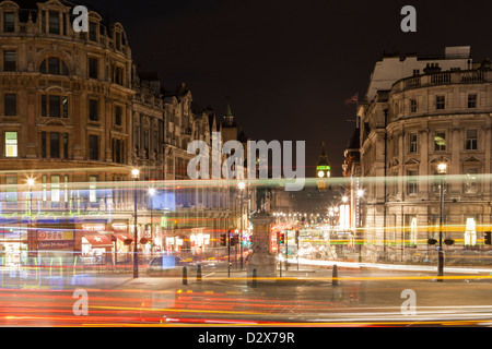 Traffic rush hour in the Trafalgar Square in London, United Kingdom, with the international landmark Big Ben, in the background. Stock Photo