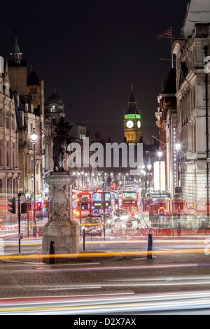 Traffic rush hour in the Trafalgar Square in London, United Kingdom, with the international landmark Big Ben, in the background, Stock Photo