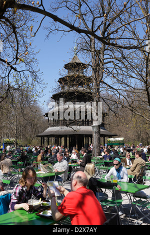 Munich, Germany, visitors in the beer garden at the Chinese Tower in the English Garden Stock Photo