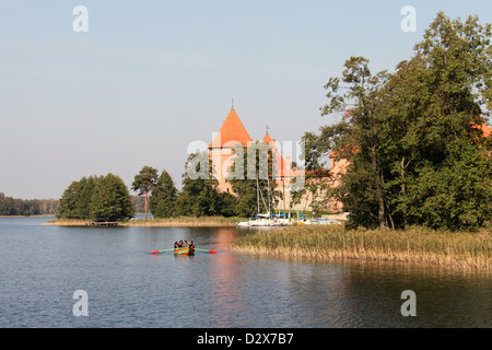 Rowing Boat on the Lake at Trakai Castle in Lithuania Stock Photo