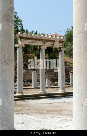 Athens. Greece. Part view of the elegant Ionic peristyle that enclosed the central open space of the ancient Roman Agora. Stock Photo