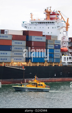 Port Botany pilot vessel alongside departing container ship as its ...