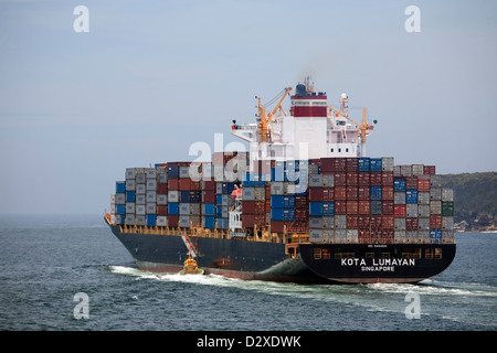 Port Botany pilot vessel alongside departing container ship as its ...