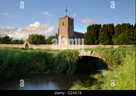 St Dunstan's Church and packhorse bridge in the village of Baltonsborough, Somerset, UK. Stock Photo