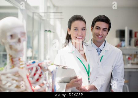 Portrait of smiling scientists in laboratory Stock Photo