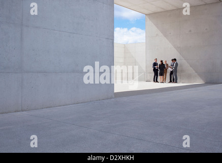 Business people meeting outside modern building Stock Photo